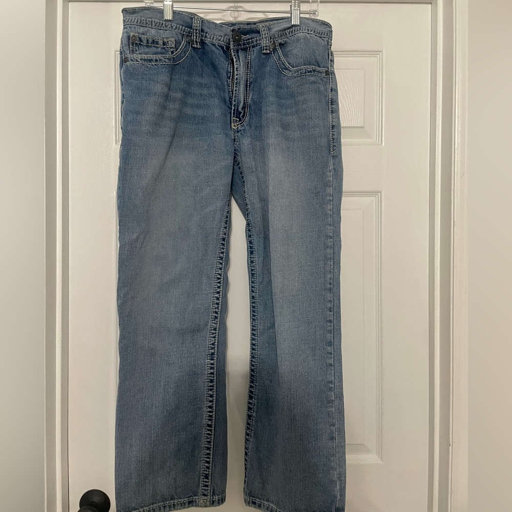 Man jeans with stitching
